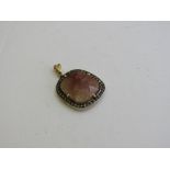Gemset diamond pendant in yellow metal. Estimate £40-60.