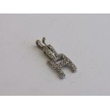 White metal diamond set 'H' pendant, length 2.5mm. Estimate £40-60.