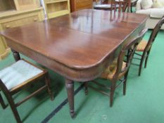 Edwardian extendable mahogany dining table on tapered fluted legs to brass castors, 180cms (