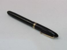 Swan leverless fountain pen with 14ct gold nib. Estimate £30-40.