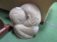 Carved stone African sculpture of crouching figure. Estimate £100-150.