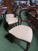 8 mahogany balloon-back dining chairs with upholstered seats. Estimate £150-200.