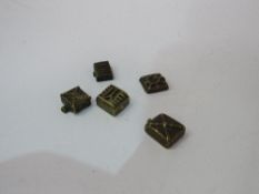 Group of 5 19th century small bronze Ashanti gold weights of various designs. Estimate £40-60.