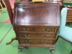 Mahogany bureau with 2 over 2 drawers, Gadroon to ball & claw feet, 77cms x 57cms x 106cms. Estimate