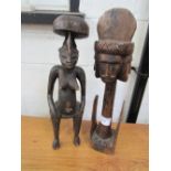 2 large carved wooden African figures. Estimate £20-40.