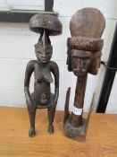 2 large carved wooden African figures. Estimate £20-40.