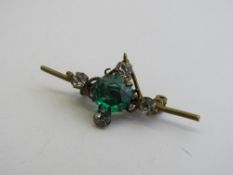 Victorian costume brooch with green & white stones, length 4cms. Estimate £10-20.