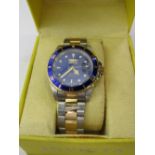 Invicta automatic gent's wristwatch, in original box, going. Estimate £100-120.