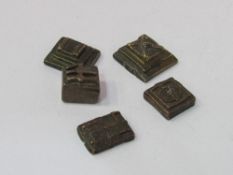 Group of 5 19th century medium bronze Ashanti gold weights of various designs. Estimate £50-80.