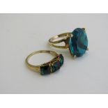 2 gold overlay on silver rings with green stone, size R. Estimate £20-30.