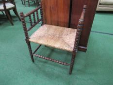 Bobbin turned string seat stool with 2 sides. Estimate £20-40.