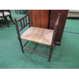 Bobbin turned string seat stool with 2 sides. Estimate £20-40.