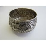 Sterling silver bowl repousse decorated with scrolls & a small elephants. Estimate £40-60.