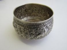 Sterling silver bowl repousse decorated with scrolls & a small elephants. Estimate £40-60.