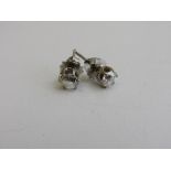 18ct white gold & diamond stud earrings, approx 1/2 carat each, weight 1.2gms. Estimate £800-1,200.