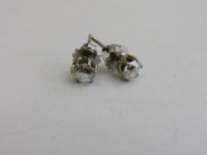 18ct white gold & diamond stud earrings, approx 1/2 carat each, weight 1.2gms. Estimate £800-1,200.