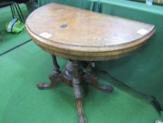 Walnut inlaid demi-lune swivel top card table on 4 pillar pedestal to 4 scroll feet. Estimate £40-