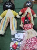 4 black dolls, 2 with goggly eyes. Estimate £40-50.