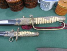 Ceremonial naval sword & dagger. Estimate £30-50.