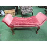 Pink upholstered long stool with shaped ends