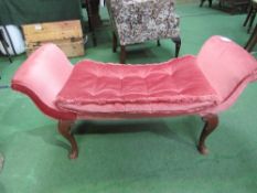 Pink upholstered long stool with shaped ends