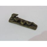 Rare 19th century Ashanti bronze snake attacking snake gold weight. Estimate £30-50.