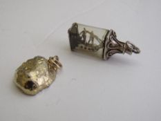 Gold plated Geode pendant/charm & a ship in a bottle silver charm. Estimate £10-20.