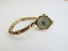 9ct rolled gold on silver cocktail watch with pearlescent face. Estimate £100-150.