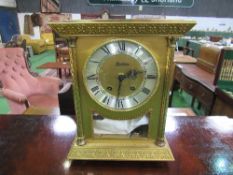 Mid-century satin effect brass architectural mantle clock, going order. Estimate £80-120.