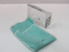 Tiffany & Co wedge shape paperweight in original box & pouch. Estimate £40-50.