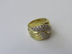 18ct gold & diamond double snake ring, size J, weight 10.9gms. Estimate £500-600.