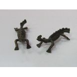 Pair of rare 19th century Ashanti bronze crocodile design gold weights. Estimate £60-90.