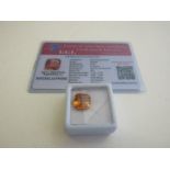 Natural cushion cut orange loose sapphire, weight 8.30ct with certificate. Estimate £50-70.