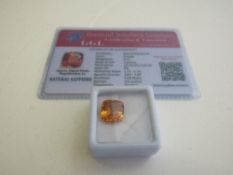 Natural cushion cut orange loose sapphire, weight 8.30ct with certificate. Estimate £50-70.