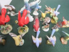 Collection of hand-painted Crown Staffordshire bird figurines. Estimate £30-40.