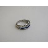 Marked 10 carat white gold, tanzanite & white stone half eternity ring, size P, weight 4.1gms.