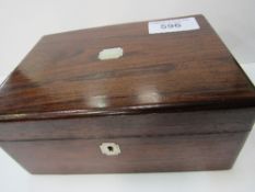 Rosewood jewellery box with mother of pearl insets. Estimate £10-20.