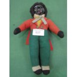 Black doll with celluloid face & opening/closing eyes. Estimate £40-50.