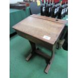 Oak school desk, 56cms x 46cms x 80cms. Estimate £10-20.