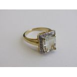 Silver gilded lady's ring with pale green stone, size R. Estimate £25-35.