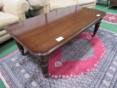 Mahogany coffee table with 3 frieze drawers, reeded legs to castors, 136cms x 68cms x 46cms.