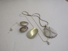 Silver pendant, opalescent heart-shaped stone on white metal chain; silver pendant; white metal