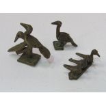 Group of 3 rare 19th century Ashanti bronze bird design gold weights. Estimate £60-90.