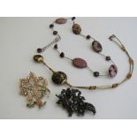 2 brooches, necklace with purple pearls & rodocrozite stone & another necklace. Estimate £10-20.