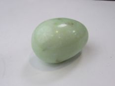 Pale green stone 'egg' (possibly jade)