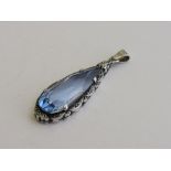 Vintage white metal & blue tear drop stone pendant, length of pendant 4.25mm. Estimate £30-50.