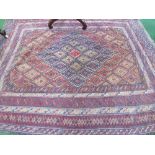 Hand knotted Persian rug with geometric design, 1.85m x 1.5m. Estimate £50-70.