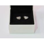 Exclusive Michael Kors heart earrings (in Pandora box). Estimate £20-30.