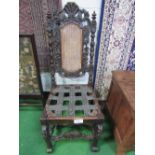 Victorian oak framed hall chair with cane panel. Estimate £20-40.