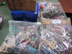 A large collection of costume jewellery: 3 bags & 2 boxes. Estimate £10-20.